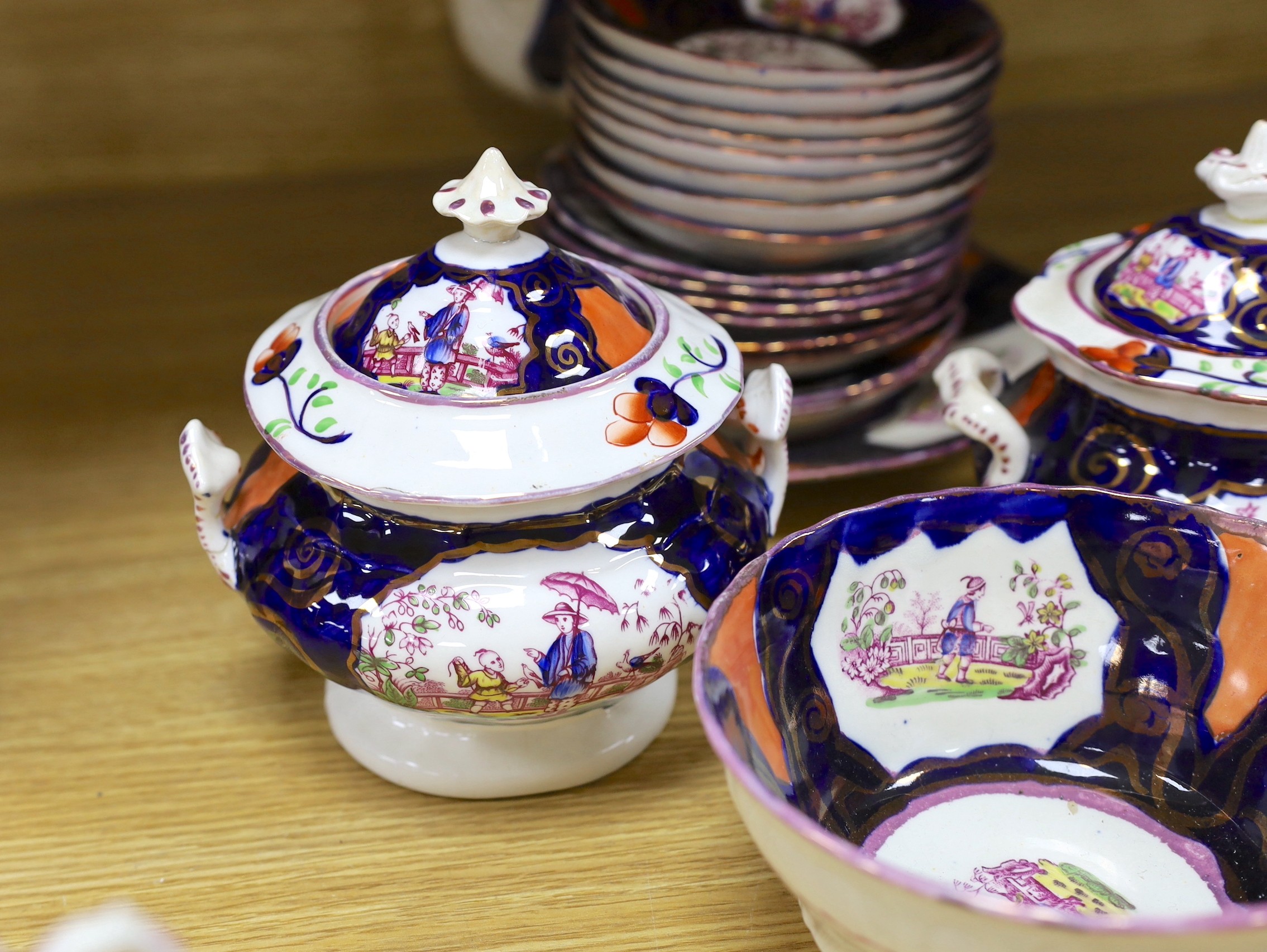 A quantity of Gaudy Welsh lustre tea wares with chinoiserie motifs